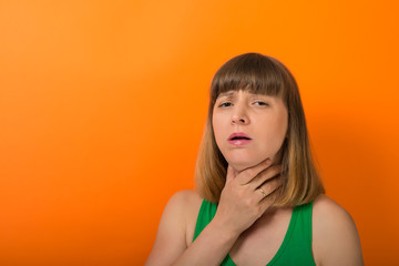 young woman have a sore throat