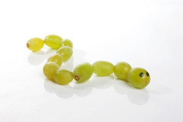Food art creative concepts. Cute animals made of green grapes over white background.