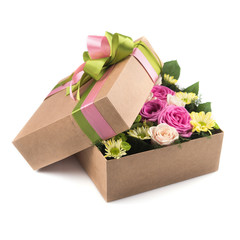 Flowers in gift box isolated