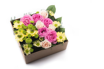Flowers in gift box isolated