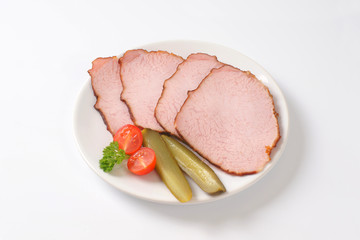 Thin sliced smoked pork meat