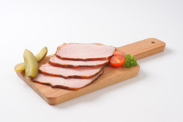 Thin sliced smoked pork meat