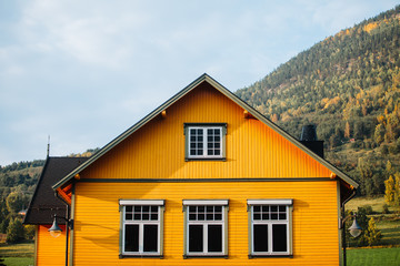Yellow painted wooden house in Norway