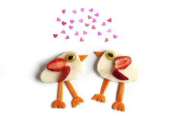 Food art creative concepts. Cute animal made of fruits such as apples and strawberry isolated on white background.