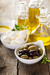 Fototapeta na wymiar Olive oil in vintage bottle