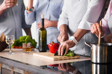 People preparing healthy food in the kitchen