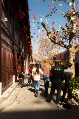 Obraz premium People in Flowers and Birds Market of Kunming is located in the center of Kunming’s downtown area, Yunnan, China.