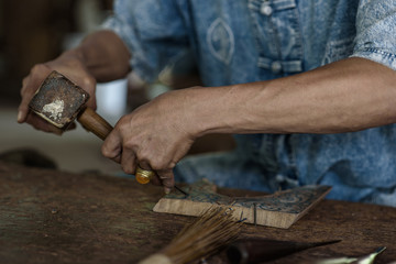 beautiful wood carver in Thailand