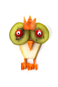 Naklejki Food art creative concepts.  Funny animal made of fruits, such as pear and grapes isolated over white background 