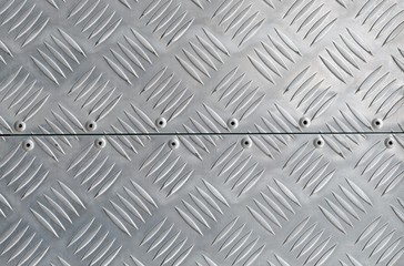 metal texture, shiny aluminum background with diagonal relief part