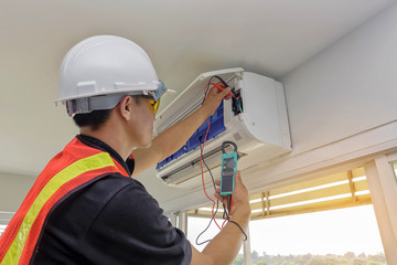 Technician - Engineer investigate Repairing Air Conditioner - 121837479