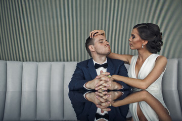 The couple in love sitting on the restaurant