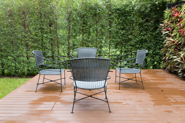 rattan wicker chair and desk on patio