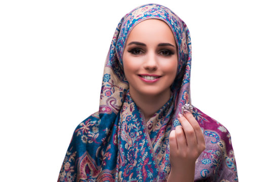 Woman in traditional muslim cover with ring
