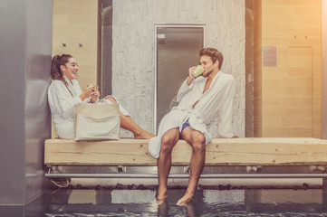 Loving couple have fun at the spa
