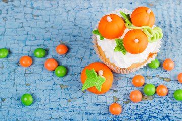 Halloween cupcake with colored decorations