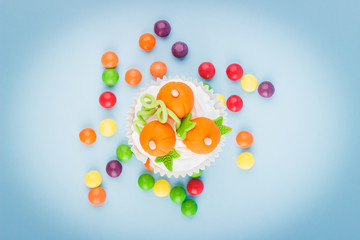 Halloween cupcake with colored decorations
