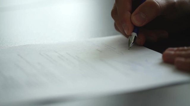 Close up business man signing contract making a deal, classic business