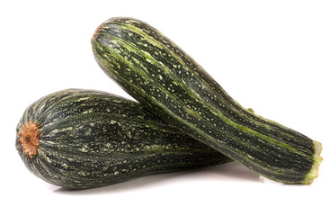 Two green zucchini isolated on white background
