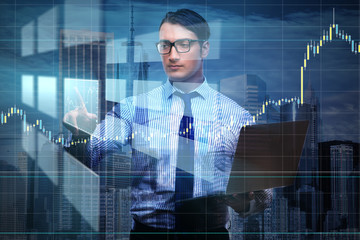 Young businessman in online trading concept