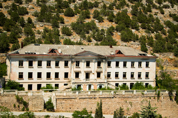 Obraz premium The old administrative building of the Soviet times. House in the mountains.