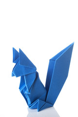 Fototapeta premium Cute origami art, colored squirrel isolated over a white background