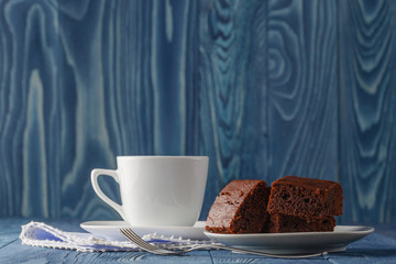 Fresh Homemade Chocolate Brownie against a background