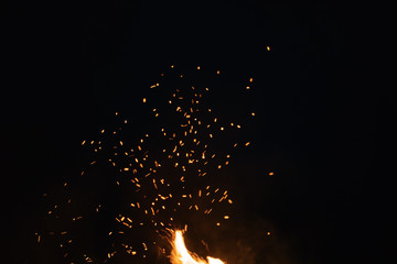 firecamp sparks over night sky