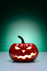 Halloween pumpkin with scary mug