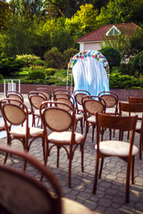 arch for the wedding ceremony, decorated with cloth flowers. Wedding decorations. wedding concept
