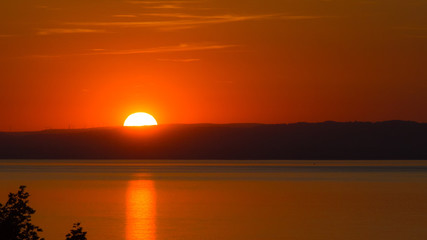 Sunset over Wales across the Severn estuary
