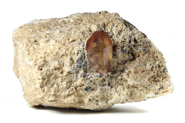 topaz  nestled in bedrock found in Mexico