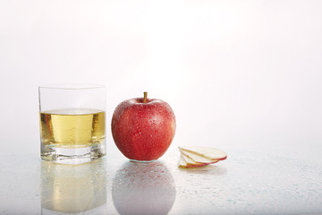 apple and apple juice on white background