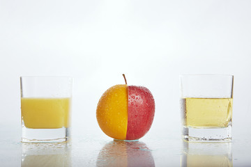 half apple half orange with juices 2