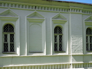Windows on the white wall of the house