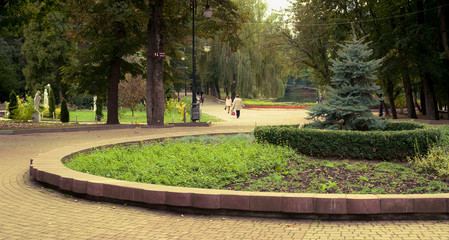 People walk in a city Park