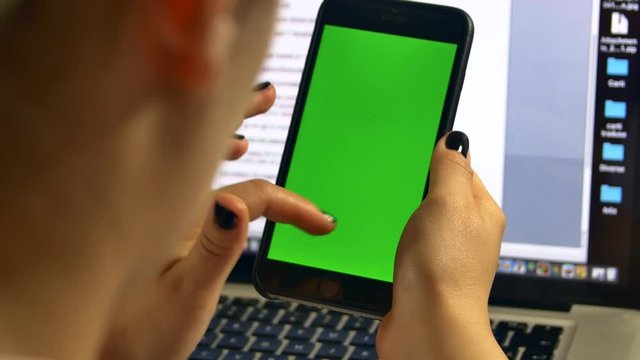 Young Assitant Surfing The Internet On Her Smart Phone During Her Break
Green Screen