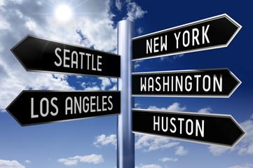 Obraz premium Signpost - cities in the USA (New York, Seattle, Washington, Los Angeles, Huston).
