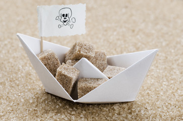 Brown sugar cubes in a brouw sugar sea