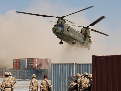 Helicopter Landing at Desert Base
