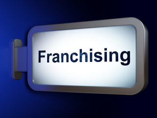 Business concept: Franchising on billboard background