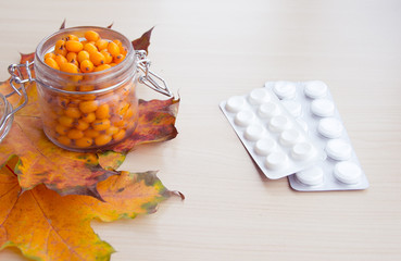 sea-buckthorn berries and autumn leaves, alternative medicine