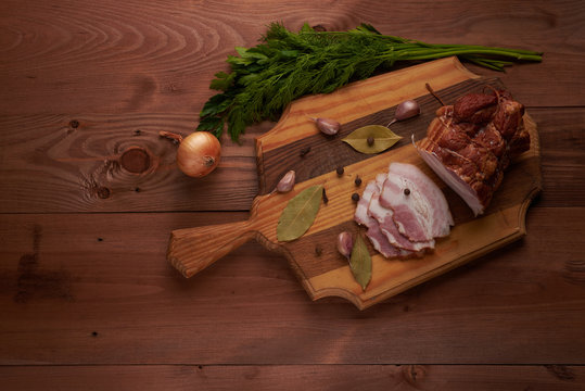 bacon and seasonings on a wooden table