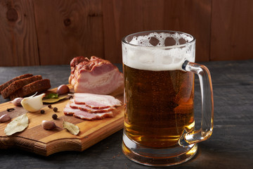 bacon and glass of beer on a table