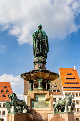 Fototapeta na wymiar Fountain at Obermarkt in the old town of Freiberg, Saxony, Germany