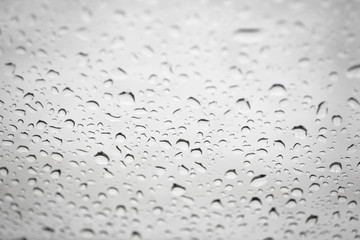 Rain drop on glass window background.
