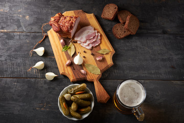 bacon and glass of beer on a table