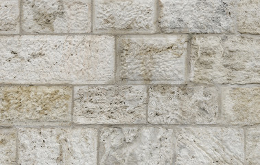 Wall made of stone blocks.