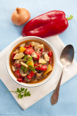 Top view on colorful vegetable stew in a bowl