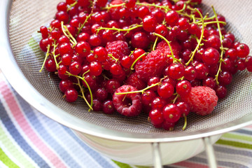 Fresh berries in a sieve